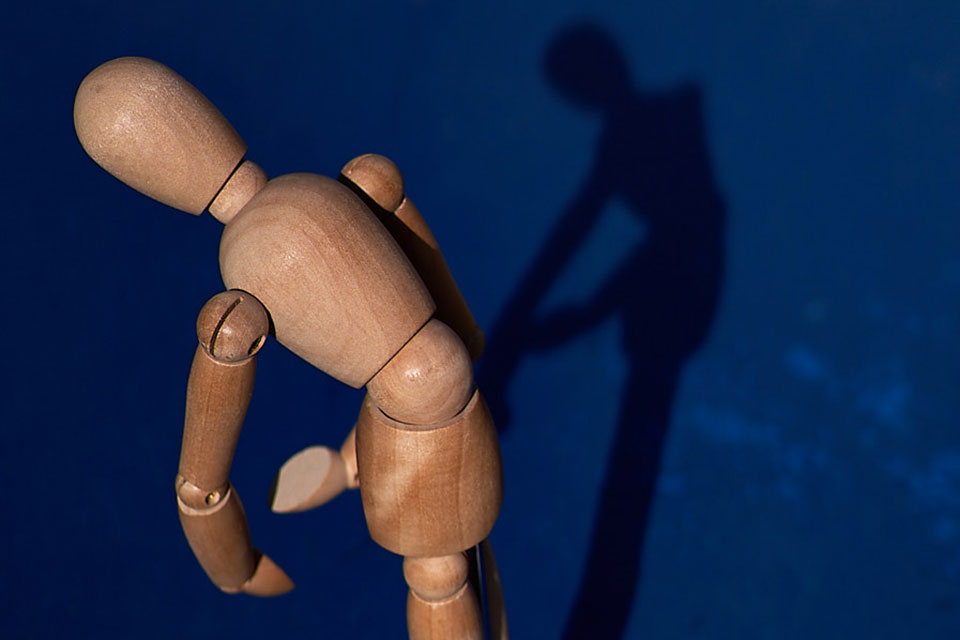 Psychotherapy with wooden figure